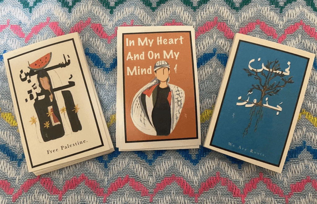 ガザ出身のデザイナーのNadaさんとご家族応援プロジェクトのステッカーの写真